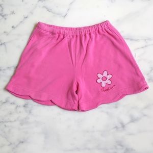 Girl's Cotton Summer Shorts with embroidered flower and pocket.